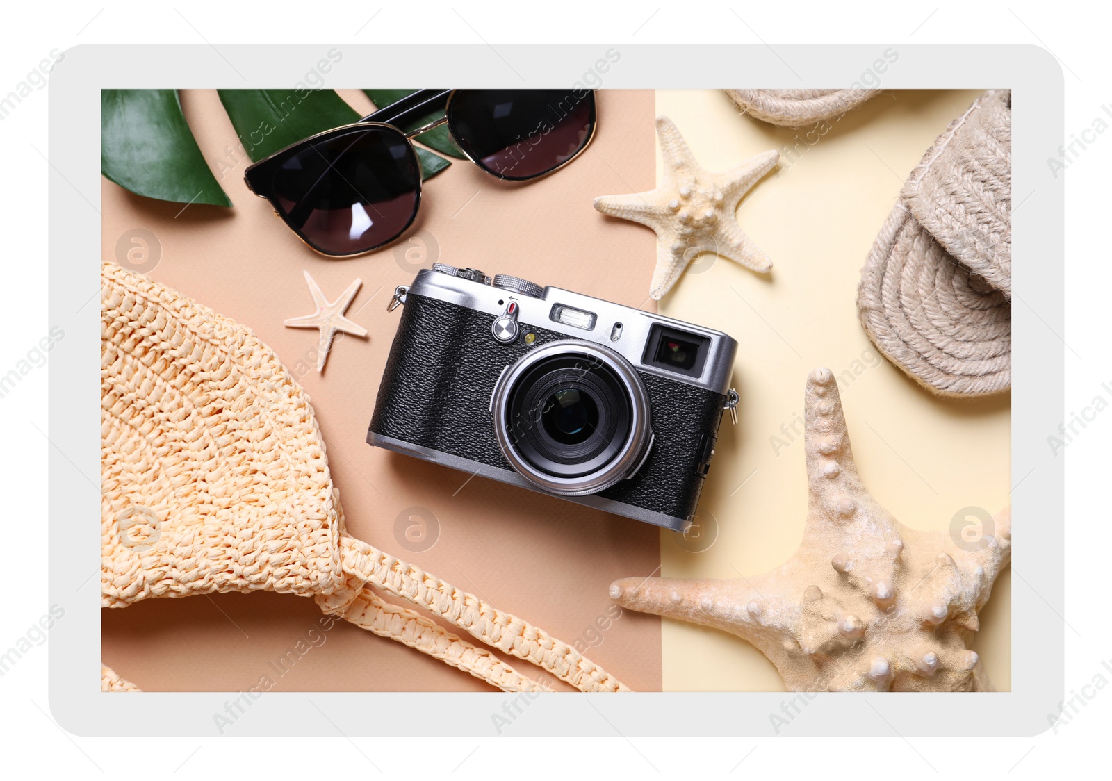 Image of Paper photo. Flat lay composition with retro camera and sunglasses on color background