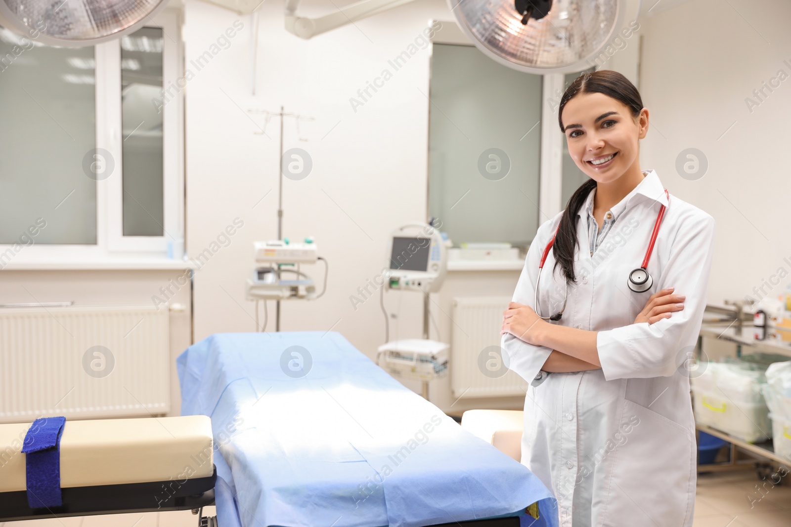 Photo of Portrait of professional doctor in modern surgery clinic. Space for text