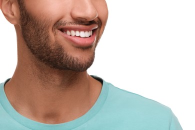 Photo of Smiling man with healthy clean teeth on white background, closeup