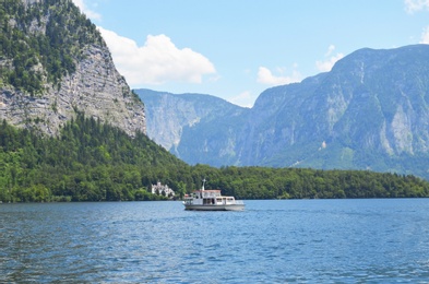 Picturesque view of river and mountains on sunny day