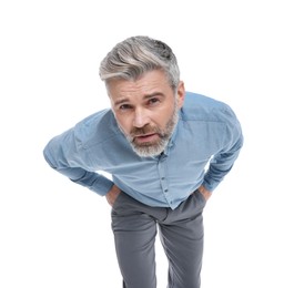 Mature businessman in stylish clothes posing on white background