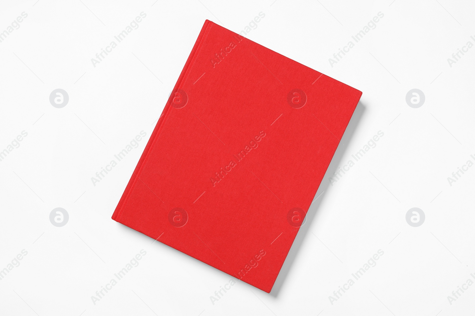 Photo of Book with red cover on white background, top view