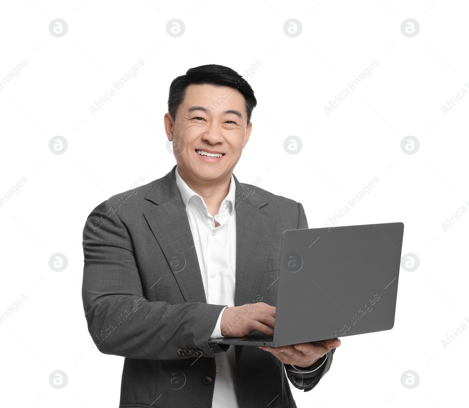 Photo of Businessman in suit working on laptop against white background