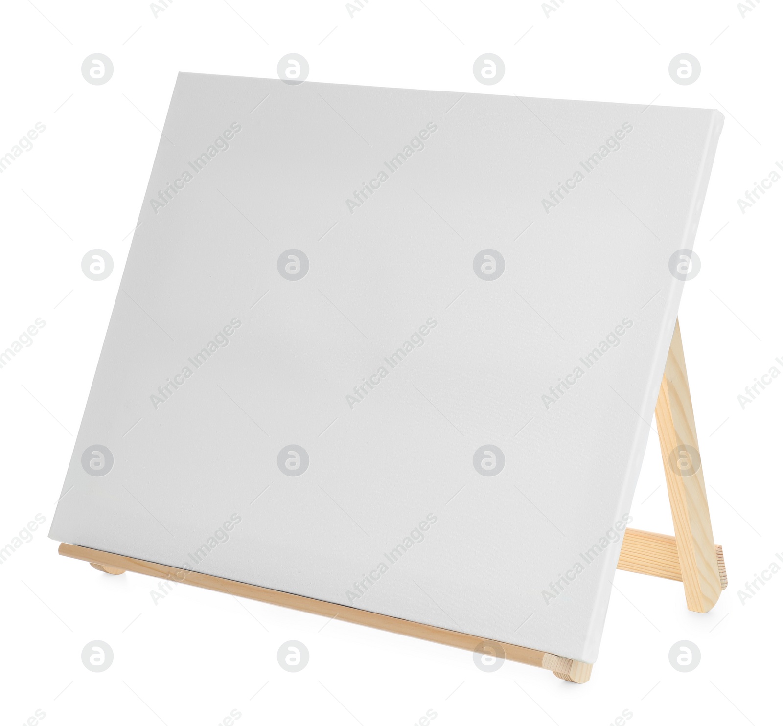 Photo of Wooden easel with blank canvas isolated on white