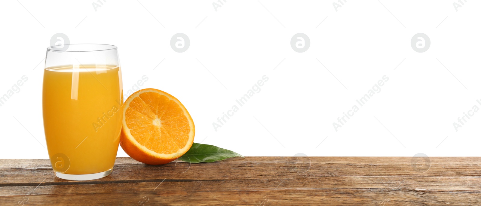 Photo of Delicious orange juice and fresh fruit on wooden table against white background. Space for text