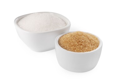 Bowls with different granulated sugar on white background