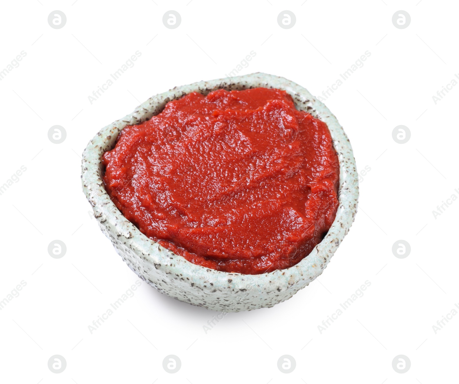 Photo of Bowl of tasty tomato paste isolated on white