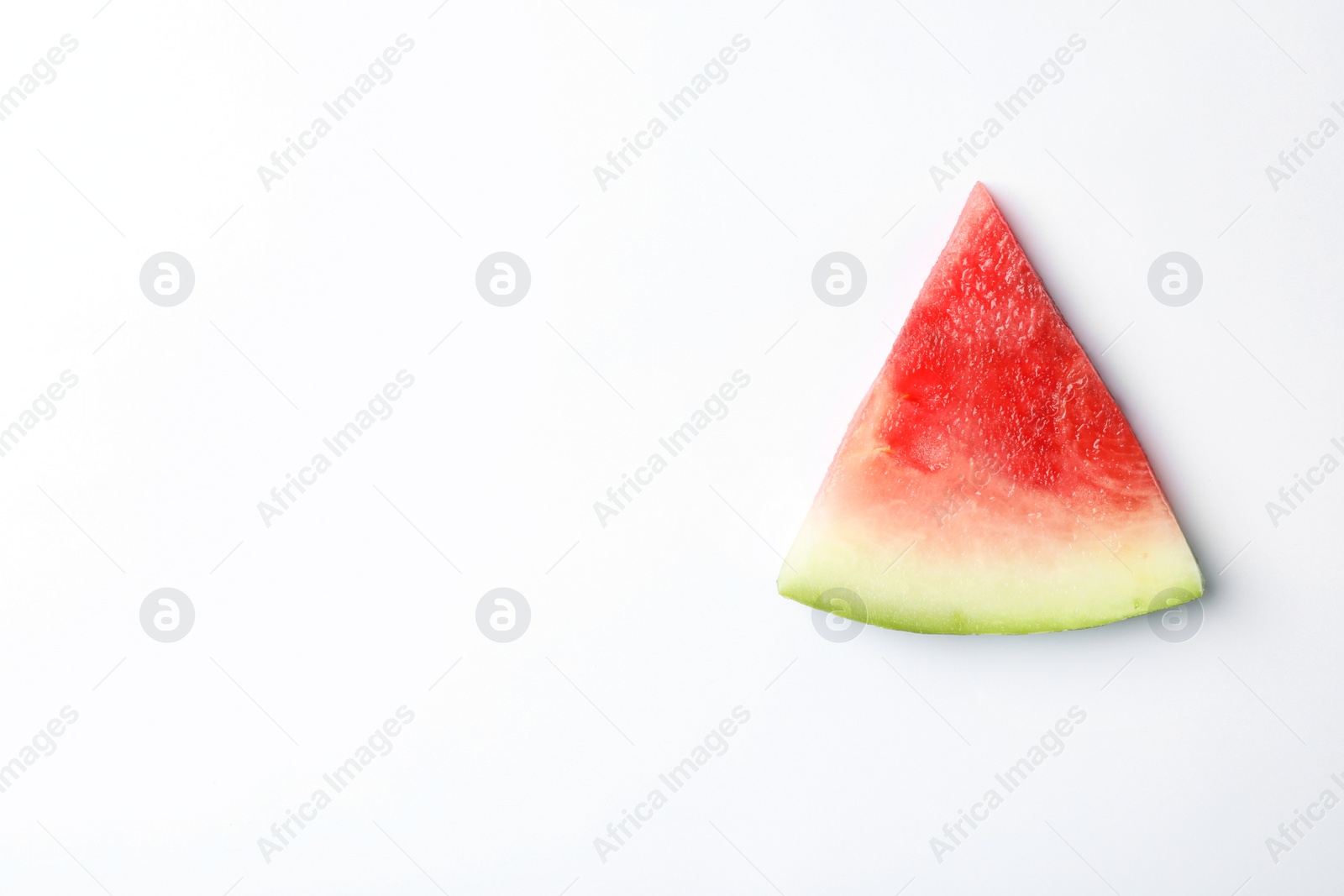 Photo of Slice of ripe watermelon on white background, top view