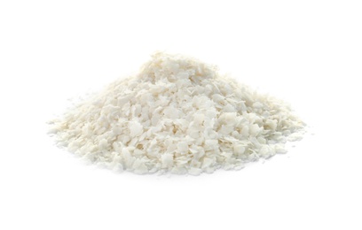 Raw rice flakes on white background. Healthy grains and cereals