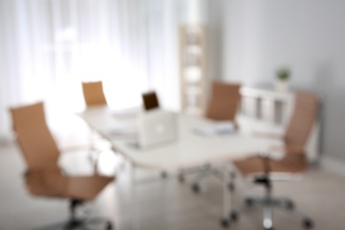 Photo of Modern brightly lit office with bokeh effect