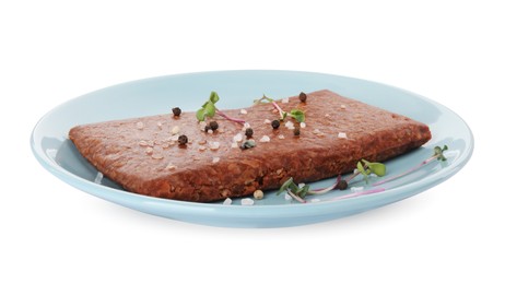 Plate with fresh raw mince and spices isolated on white. Vegan meat product