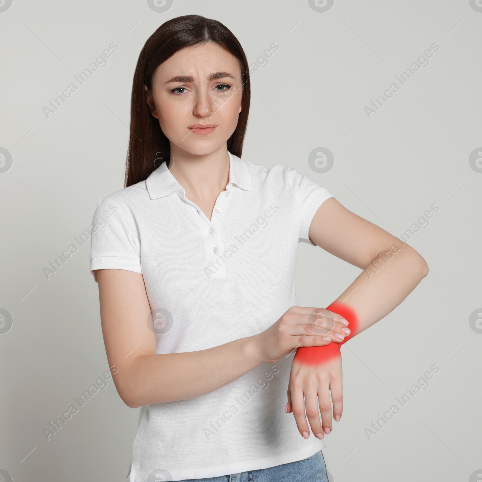 Image of Woman suffering from rheumatism on light background