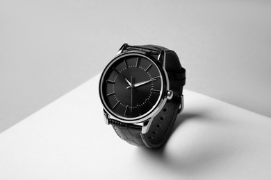 Photo of Luxury wrist watch on white background. Fashion accessory