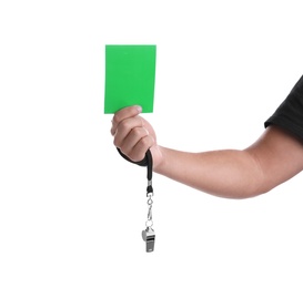 Football referee with whistle holding green card on white background, closeup