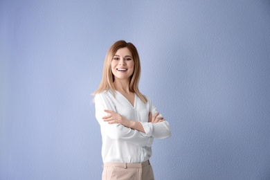 Photo of Female business trainer on color background