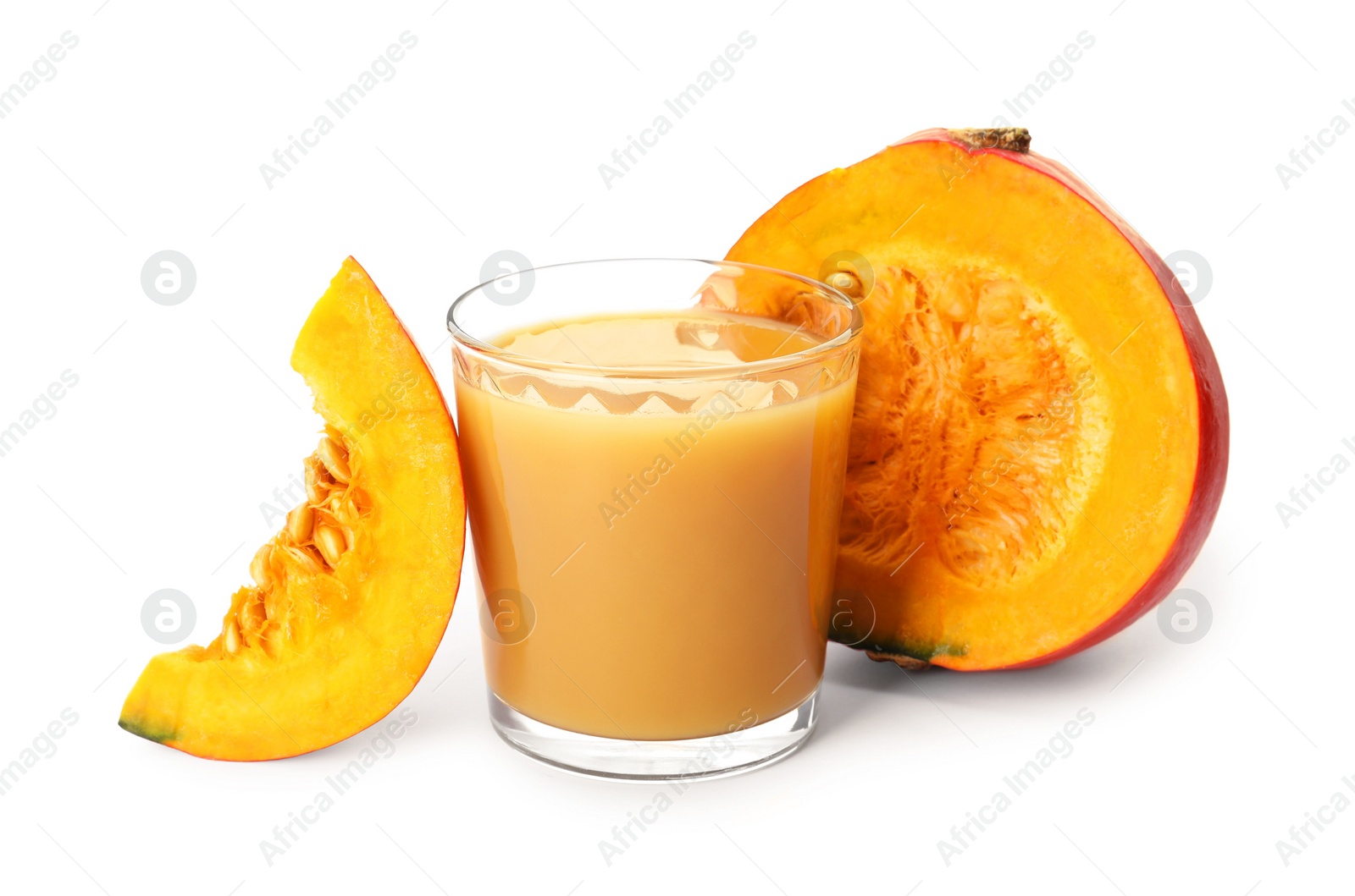 Photo of Glass with pumpkin juice and fresh vegetable on white background