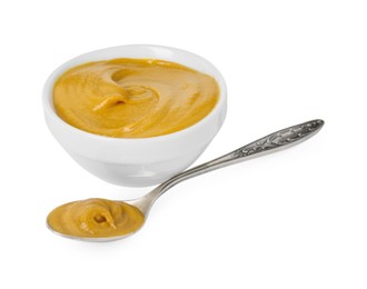 Fresh tasty mustard sauce in bowl and spoon isolated on white