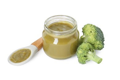 Tasty baby food in jar, spoon and fresh broccoli isolated on white