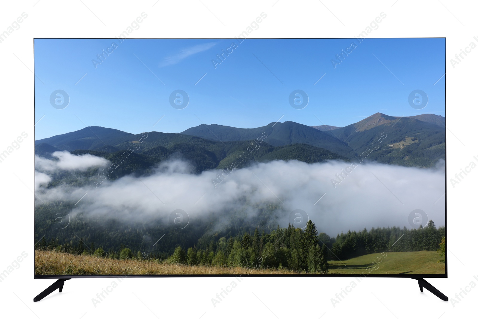 Image of Modern wide screen TV monitor showing beautiful mountain landscape isolated on white