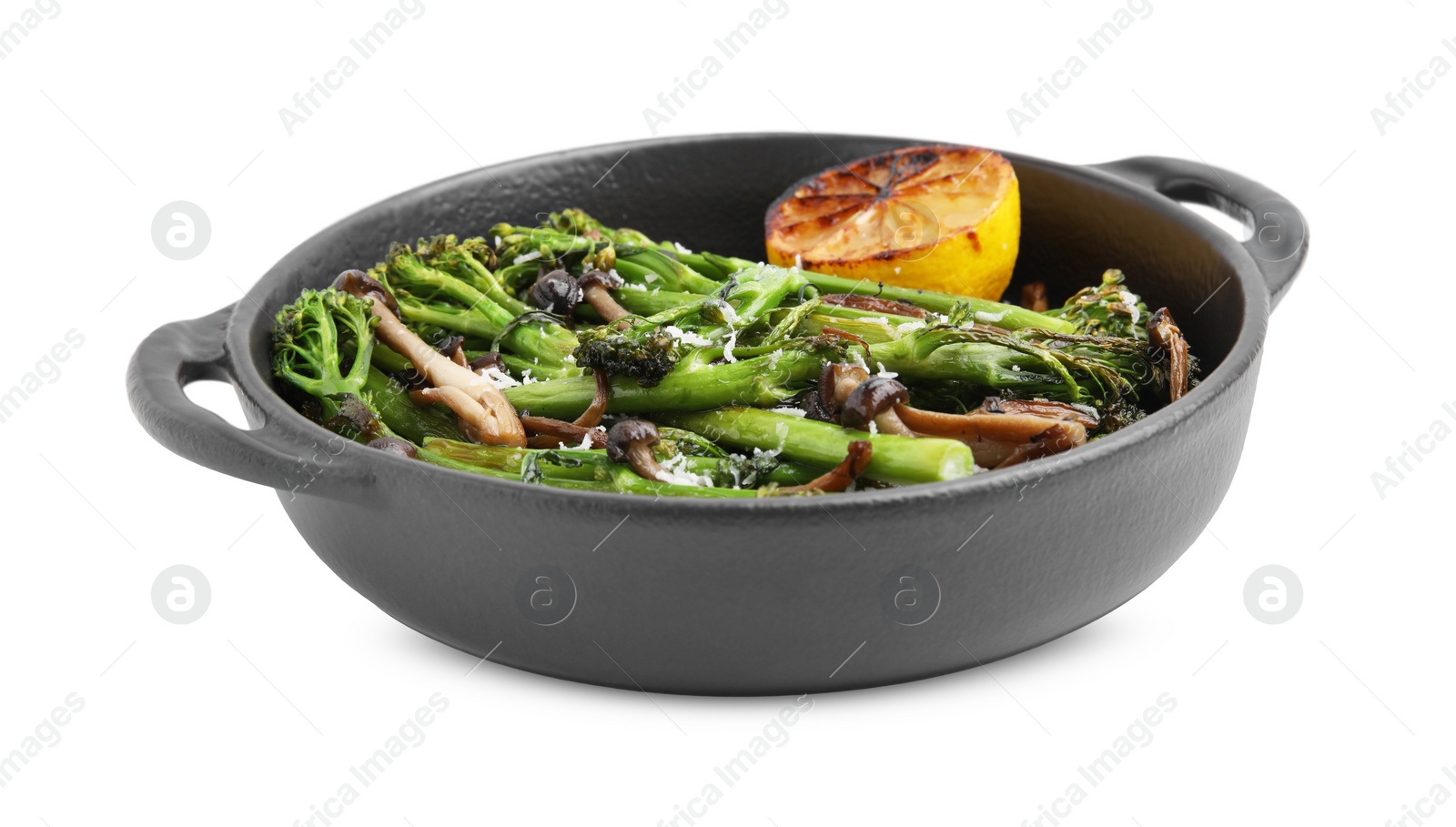 Photo of Tasty cooked broccolini, mushrooms and lemon isolated on white