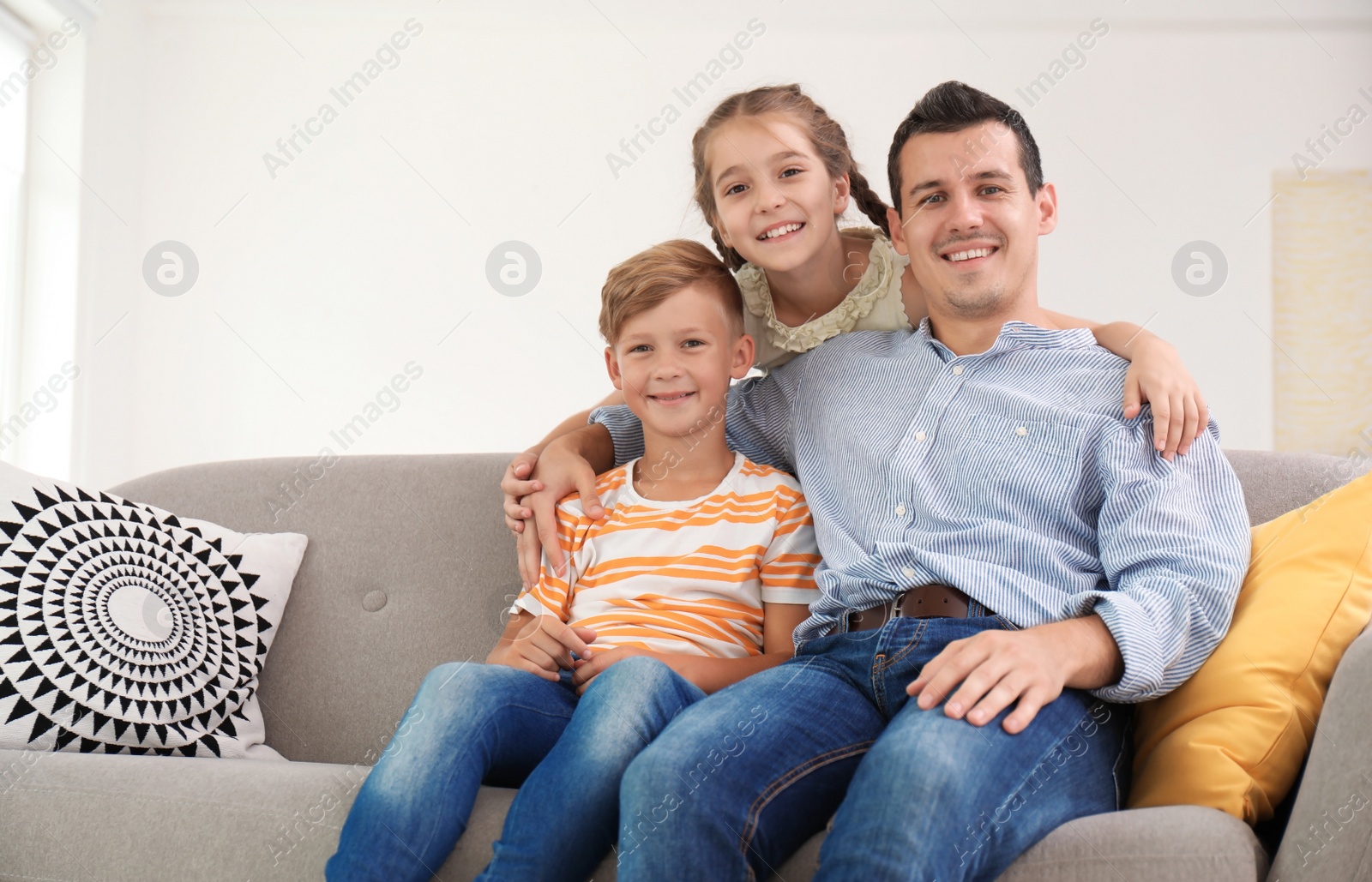 Photo of Father with cute children at home. Happy family