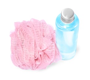 New pink shower puff and bottle of cosmetic product on white background