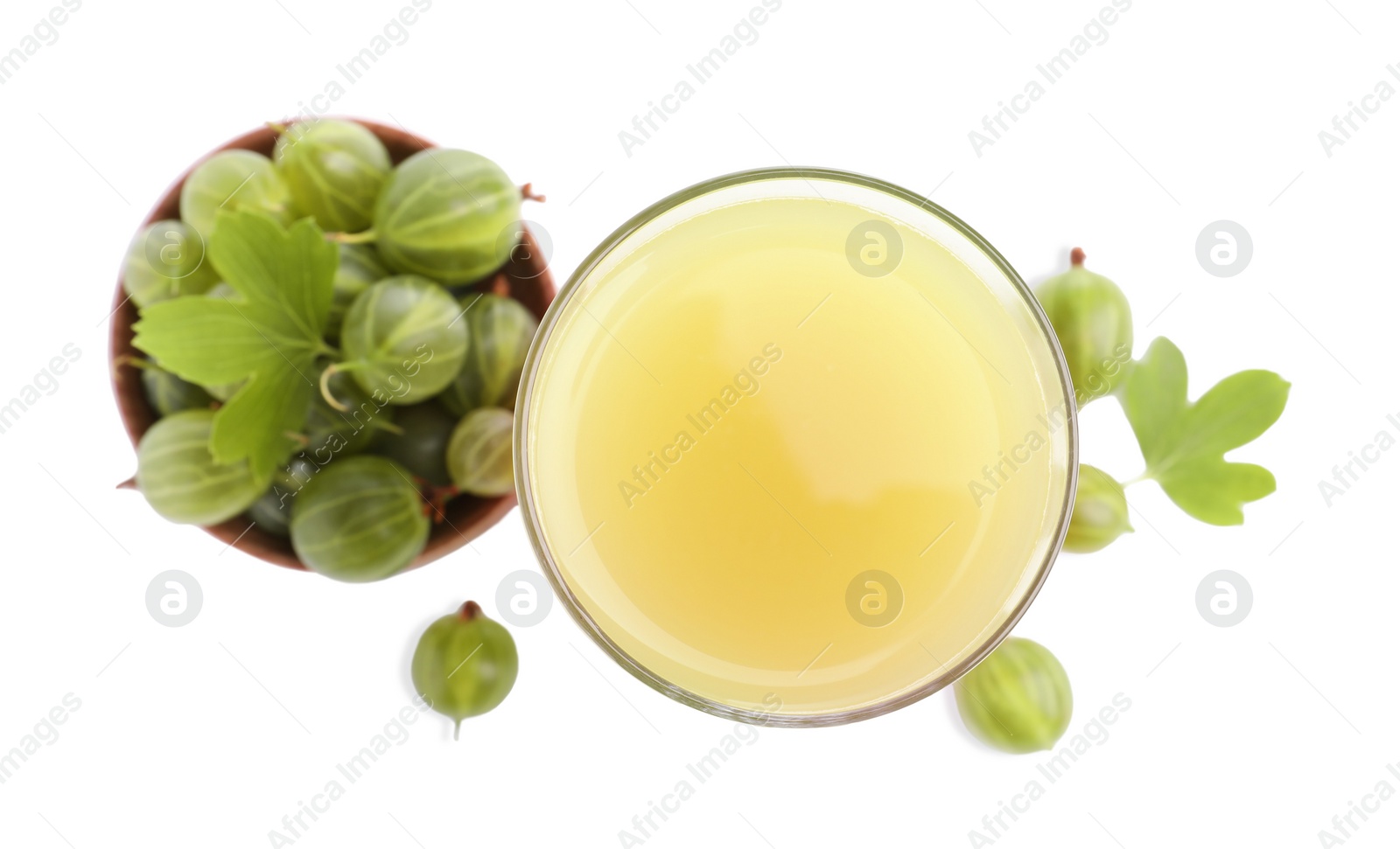 Photo of Tasty gooseberry juice in glass and fresh berries isolated on white, top view