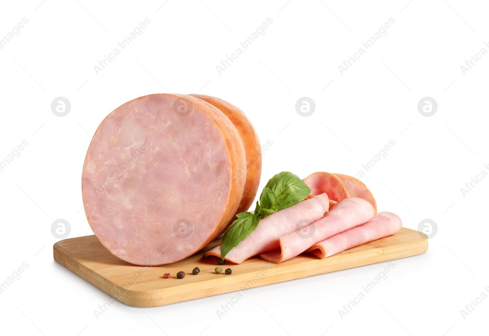 Photo of Tasty ham with basil and pepper on wooden board, white background