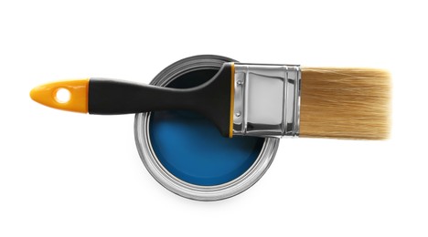 Photo of Can of blue paint and brush on white background, top view