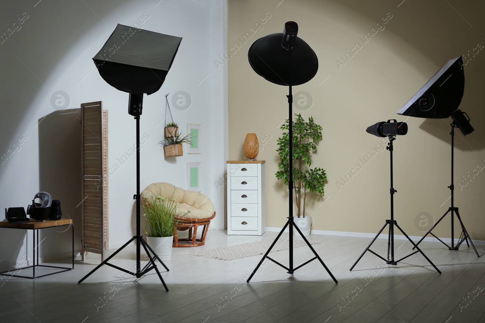 Photo of Example of living room interior design and professional equipment in photo studio