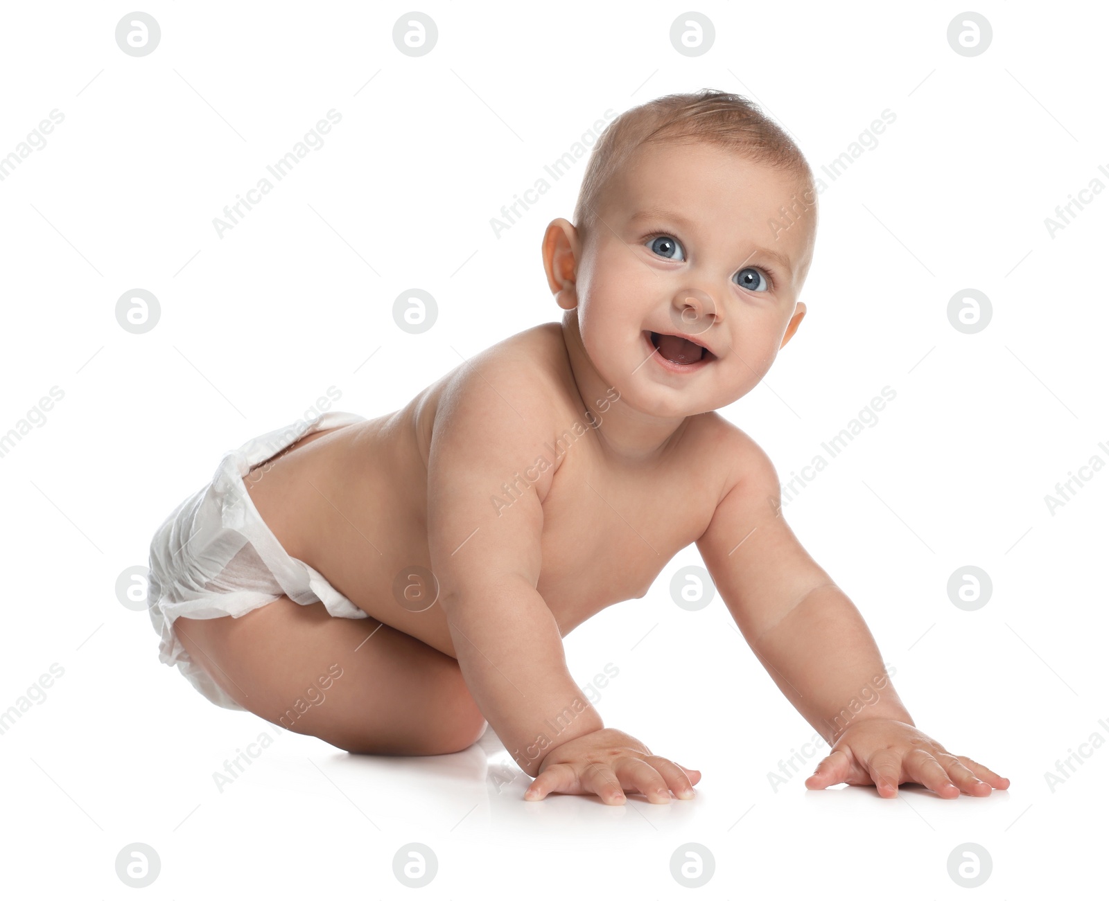 Photo of Cute little baby in diaper crawling on white background