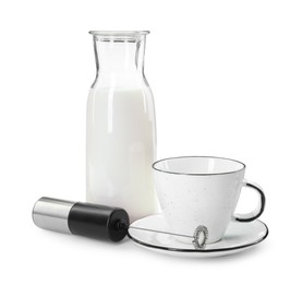 Photo of Mini mixer (milk frother), cup and bottle isolated on white