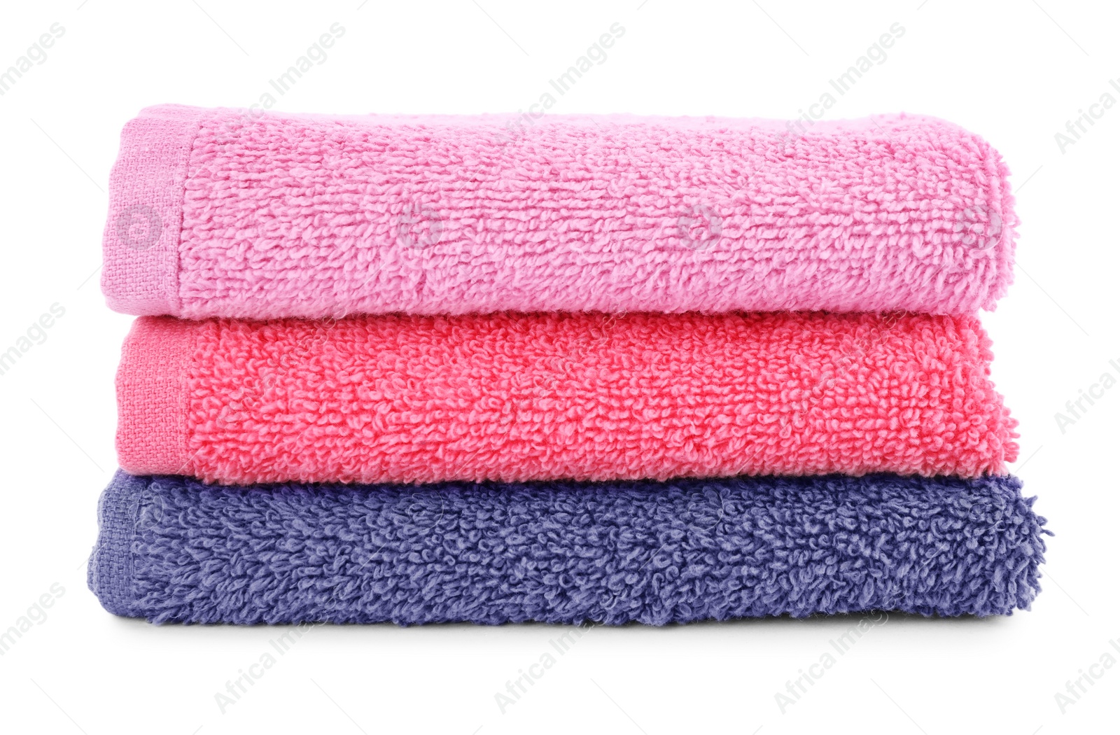 Photo of Folded soft terry towels isolated on white