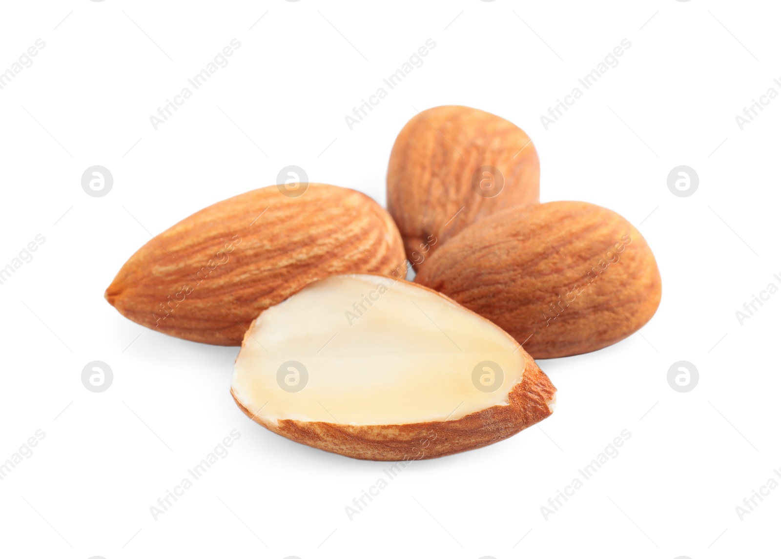 Photo of Organic dried apricot kernels on white background