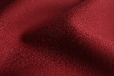 Photo of Texture of beautiful red fabric as background, closeup