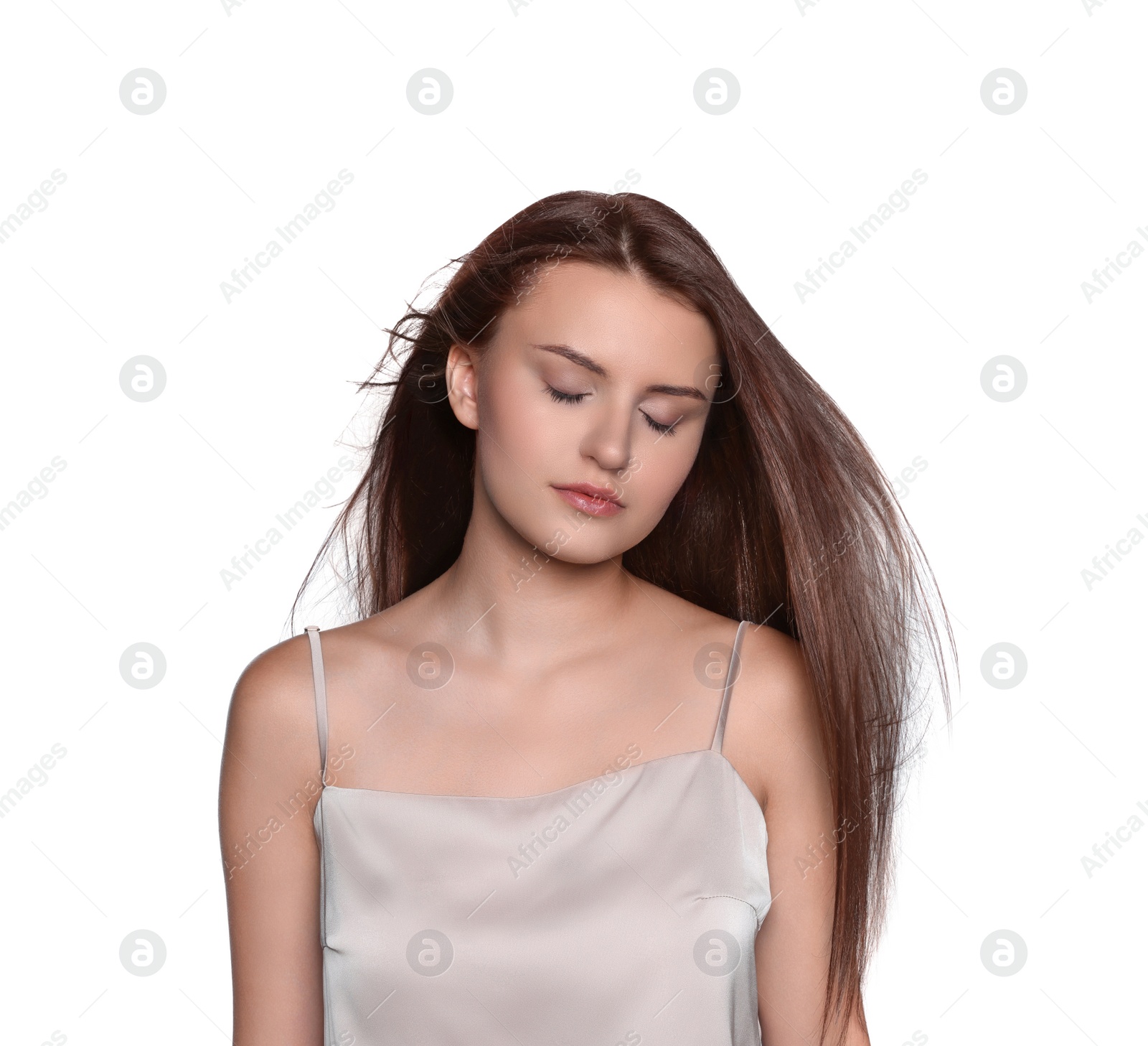 Photo of Portrait of beautiful young woman with healthy strong hair on white background