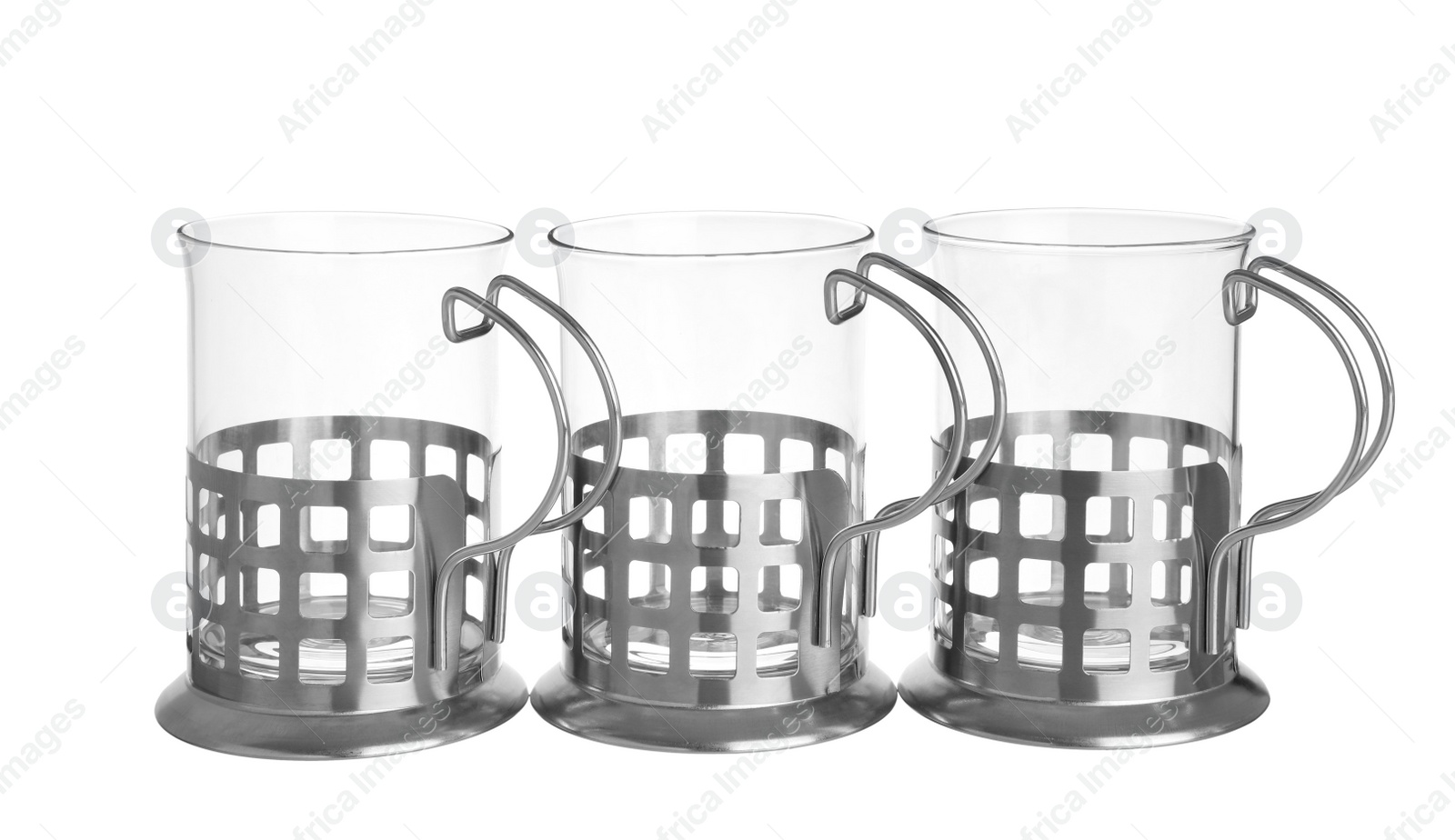 Photo of Traditional tea glass holders on white background