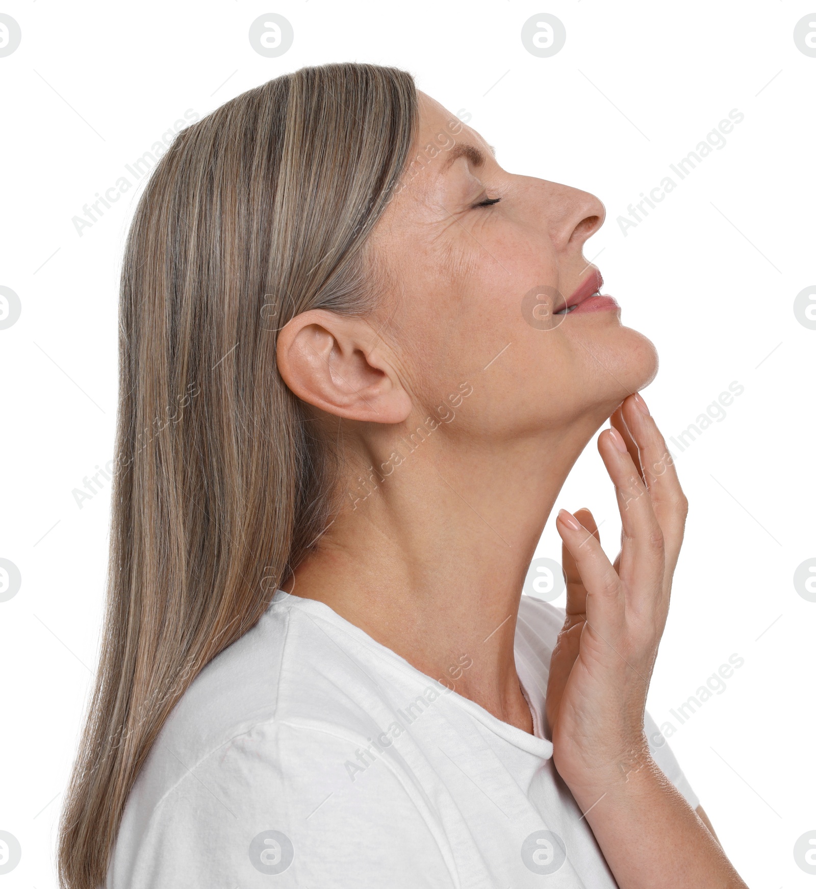 Photo of Beautiful woman touching her neck on white background