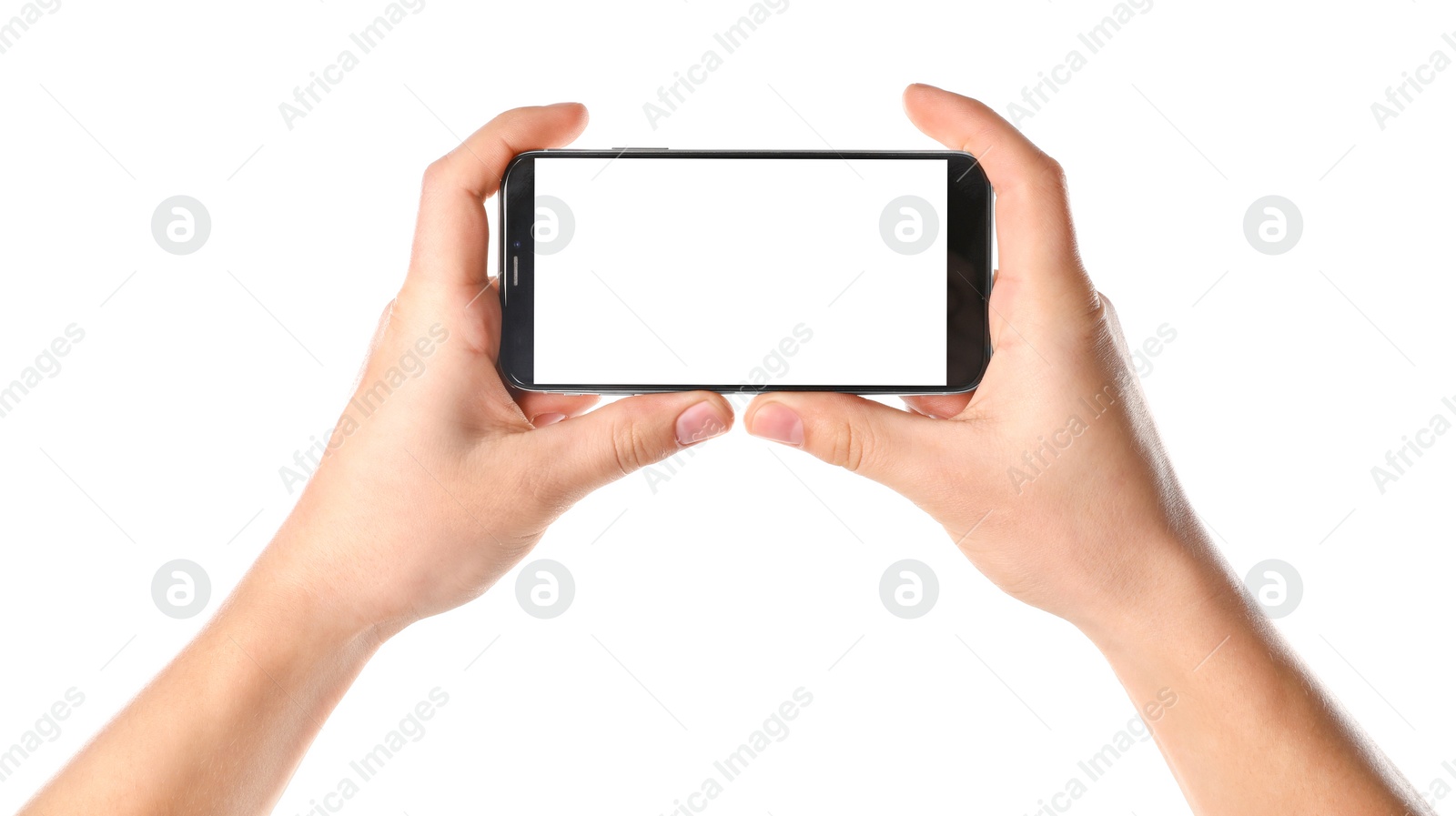 Photo of Man holding smartphone with blank screen on white background, closeup of hands. Space for text