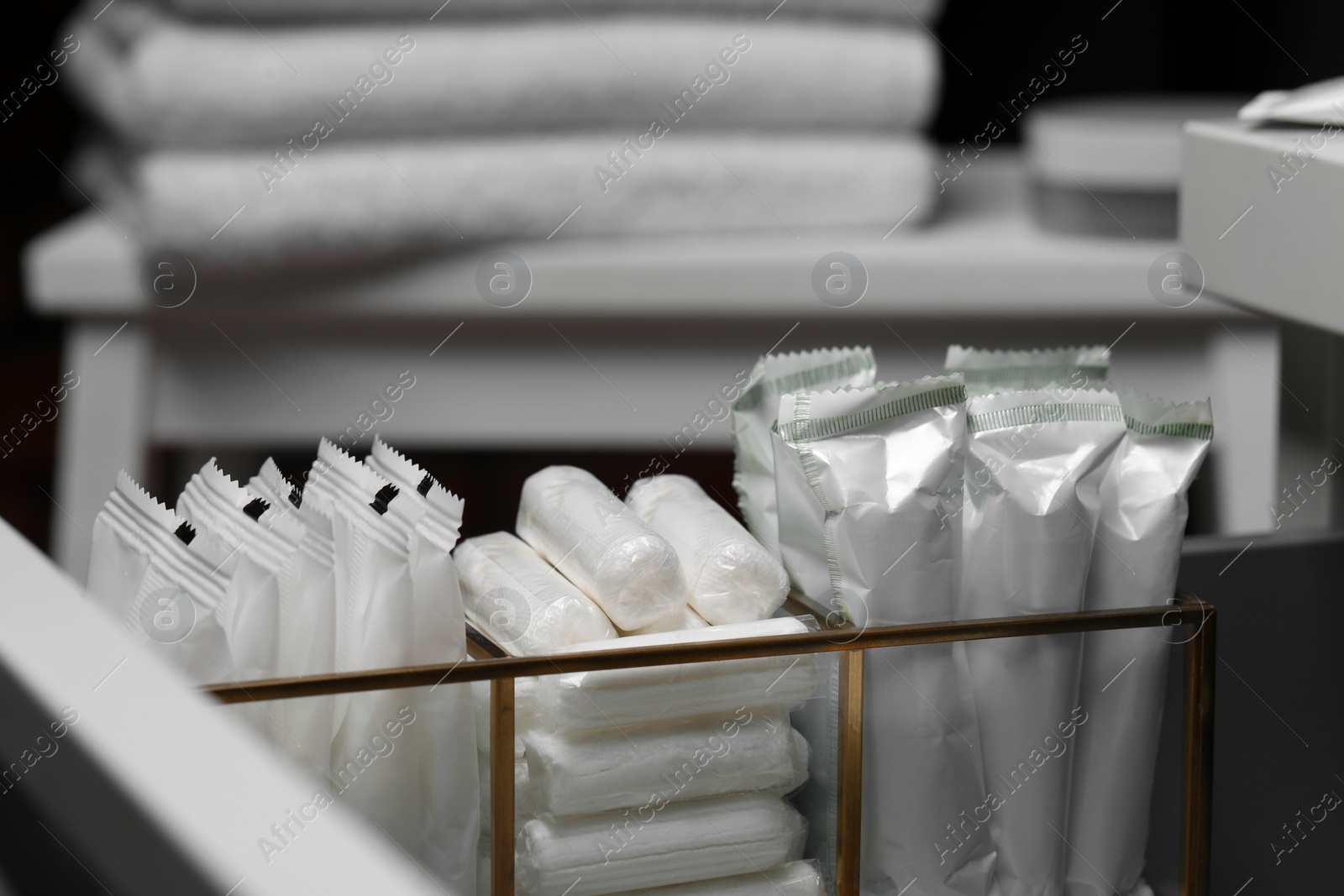 Photo of Organizer with different feminine hygiene products, closeup