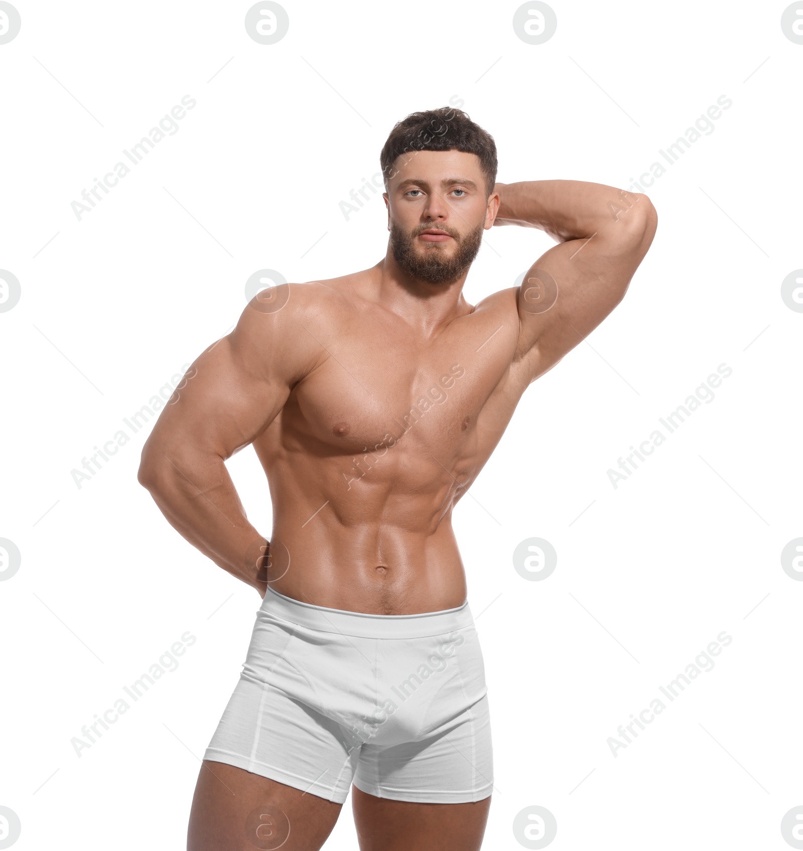 Photo of Handsome muscular man isolated on white. Sexy body