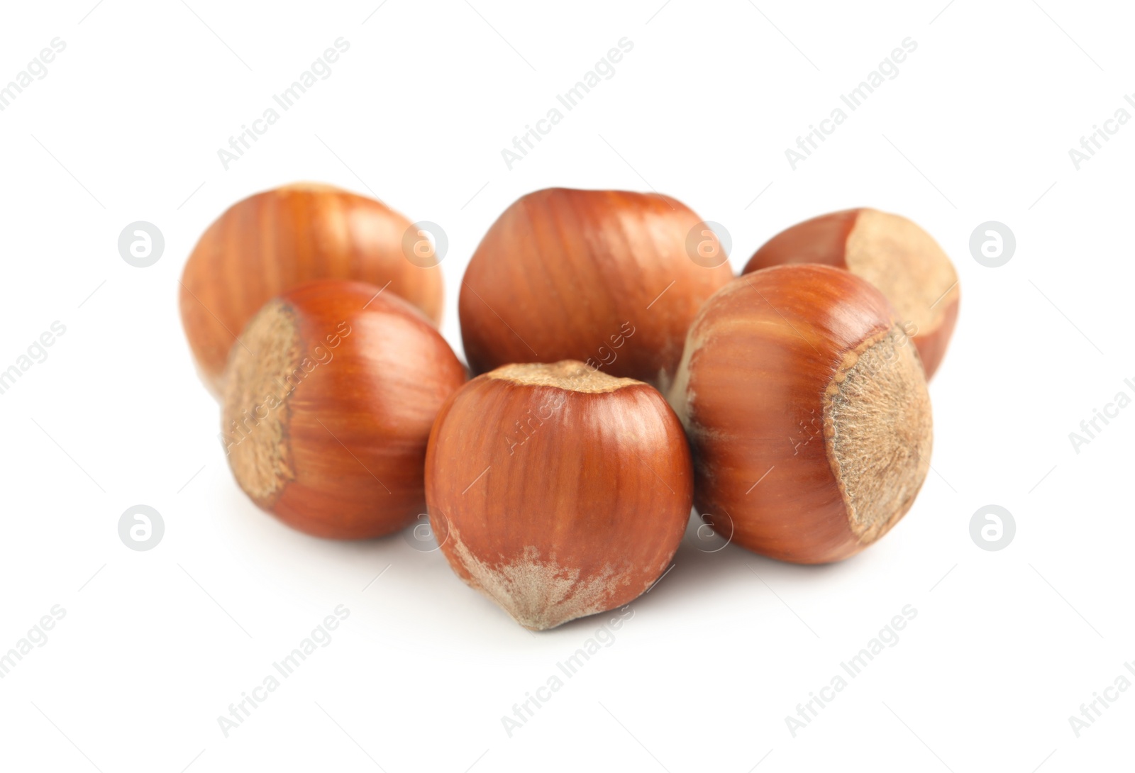 Photo of Tasty organic hazelnuts on white background. Healthy snack