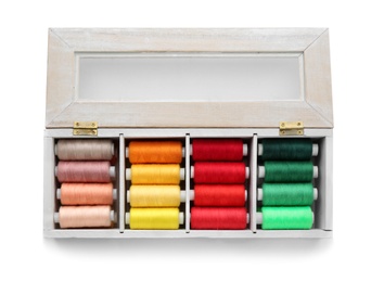 Photo of Container with set of color sewing threads on white background