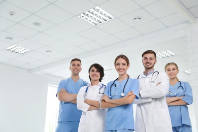 Photo of Team of doctors in uniform at workplace