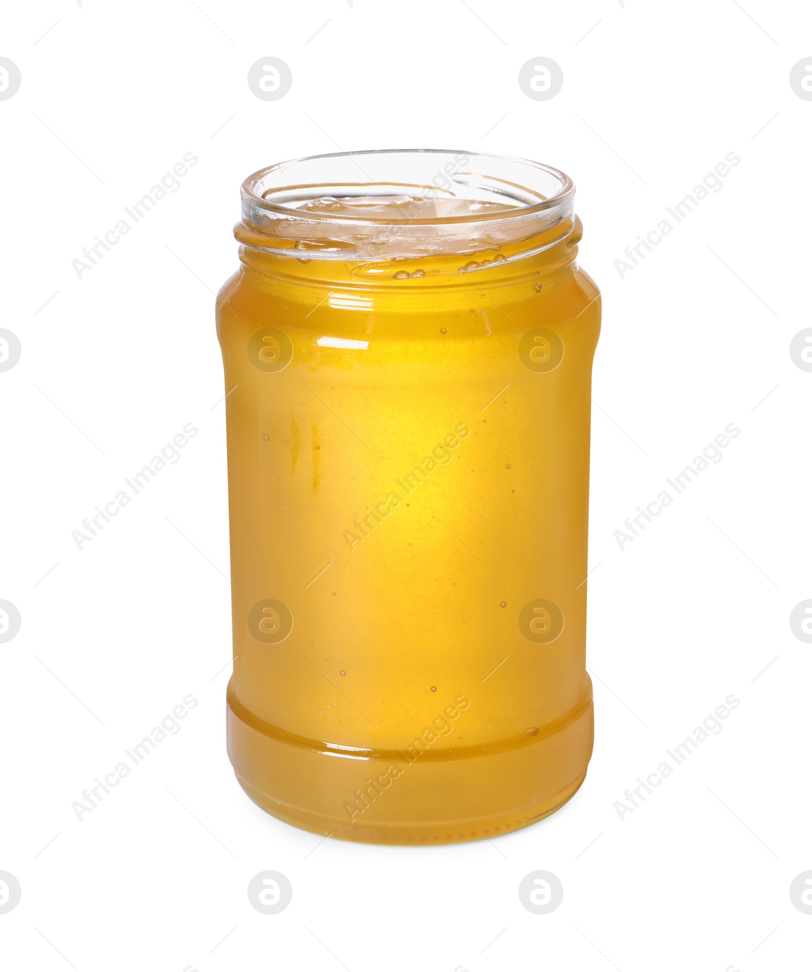 Photo of Tasty natural honey in glass jar isolated on white