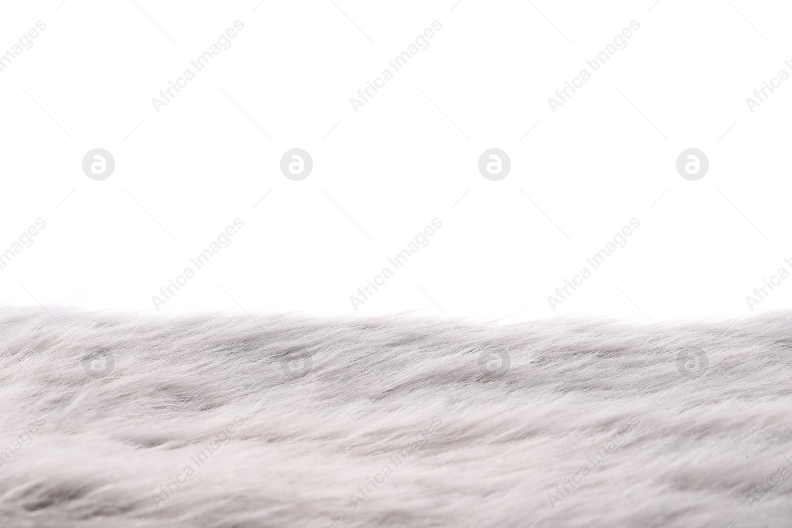 Photo of Soft grey faux fur isolated on white