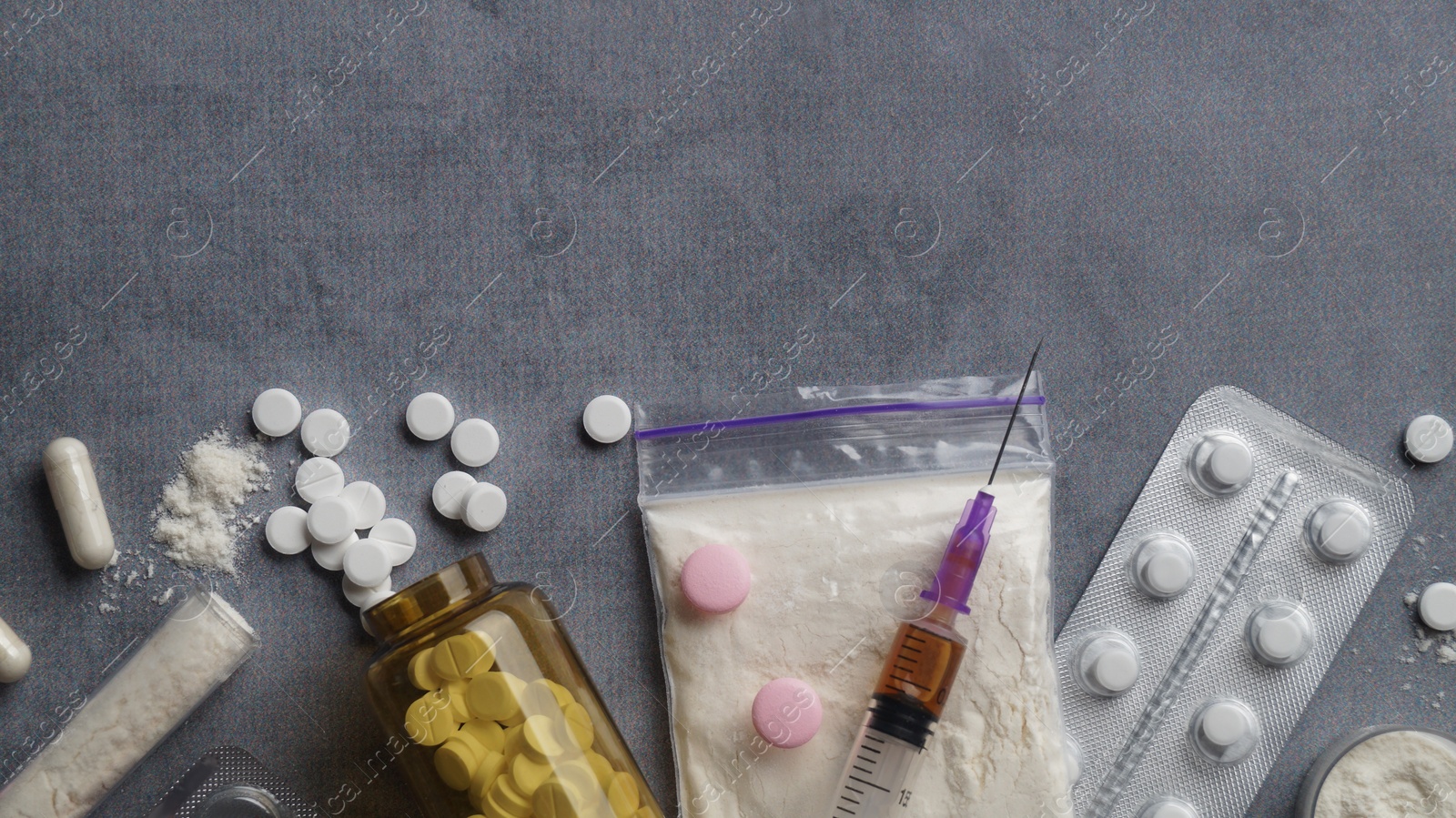 Photo of Different hard drugs on light grey table, flat lay. Space for text