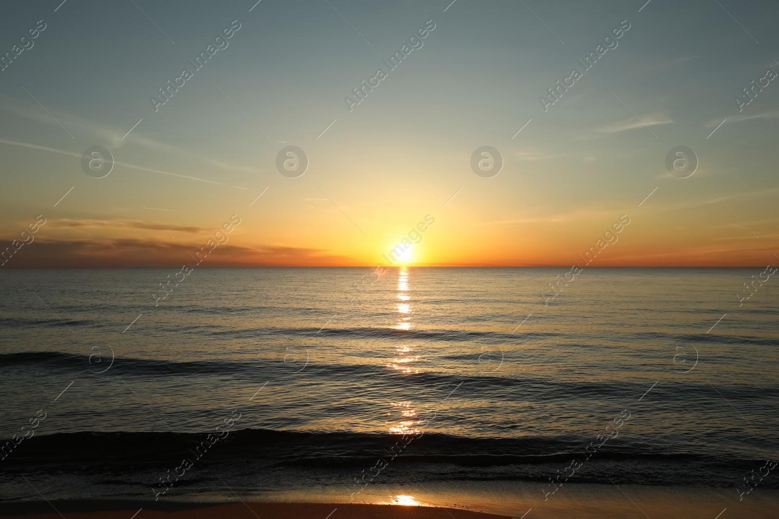 Picturesque view of beautiful sea beach at sunset Photo of Picturesque view of beautiful sea beach at sunset