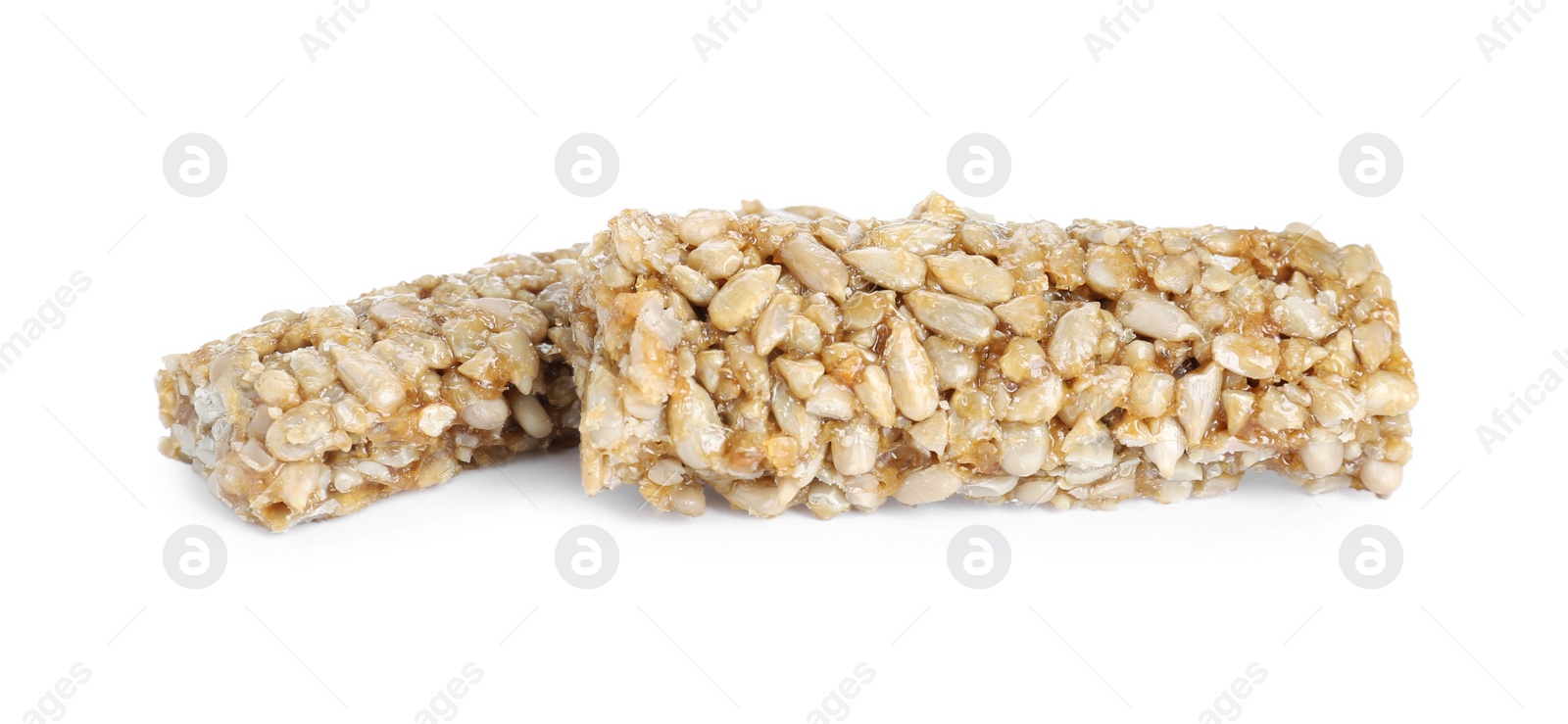 Photo of Tasty sunflower seed bars isolated on white