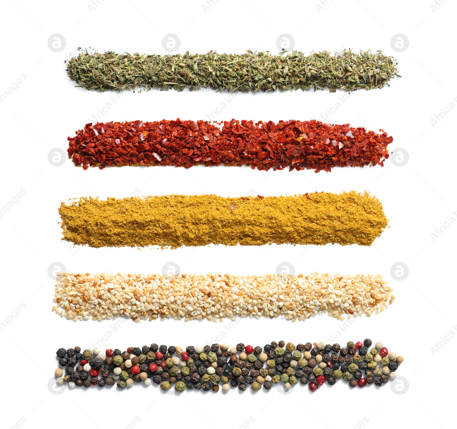 Photo of Rows of different aromatic spices on white background, top view with space for text